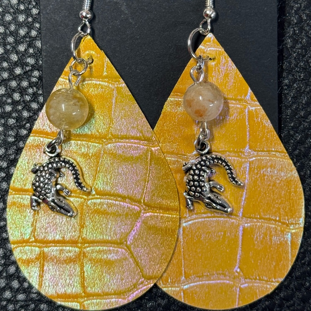 Handmade teardrop shaped reptile faux leather earrings
